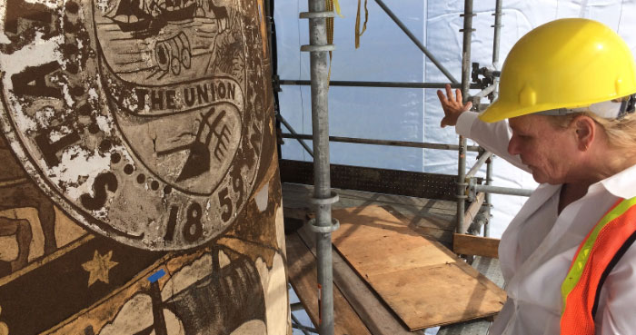 A restoration officer discusses their work on the Astoria Column